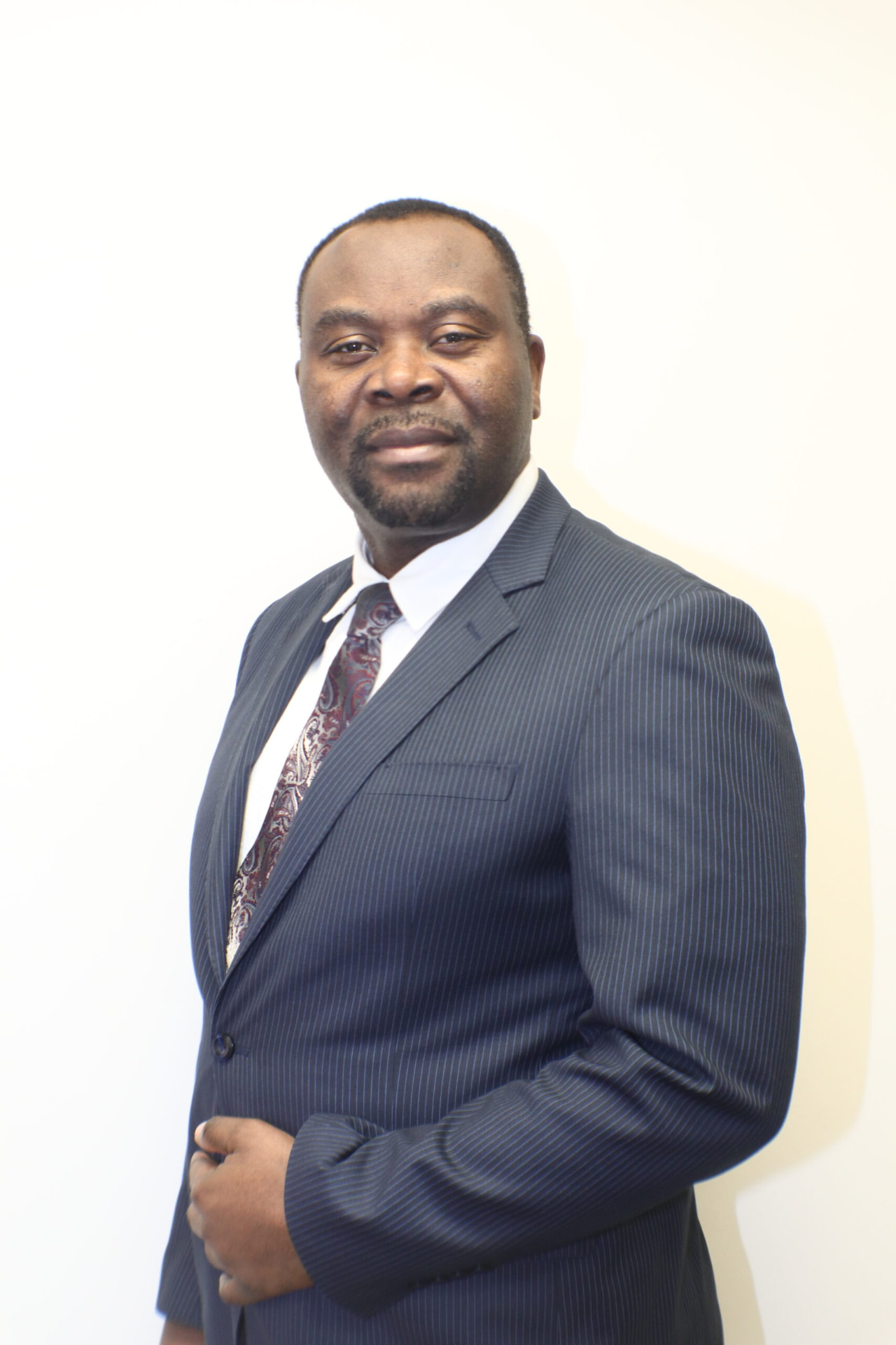 Portrait of Louis F. Fombon, Lawyer at Three Dimensions Law in Calgary